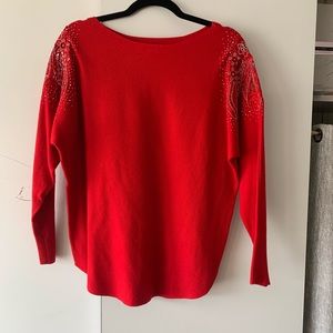 Red embellished sweater. LIV S